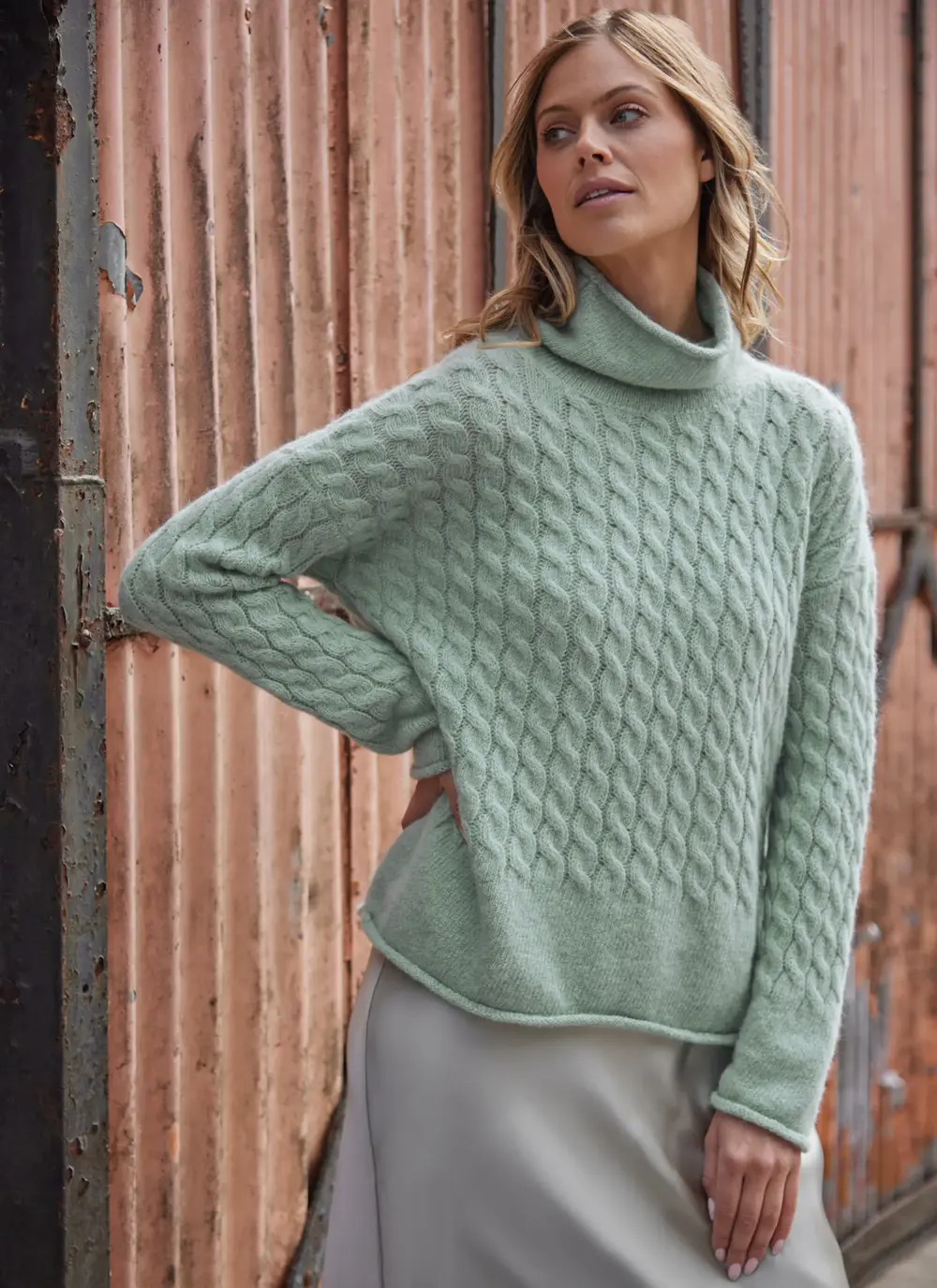 model in mint cream sweater